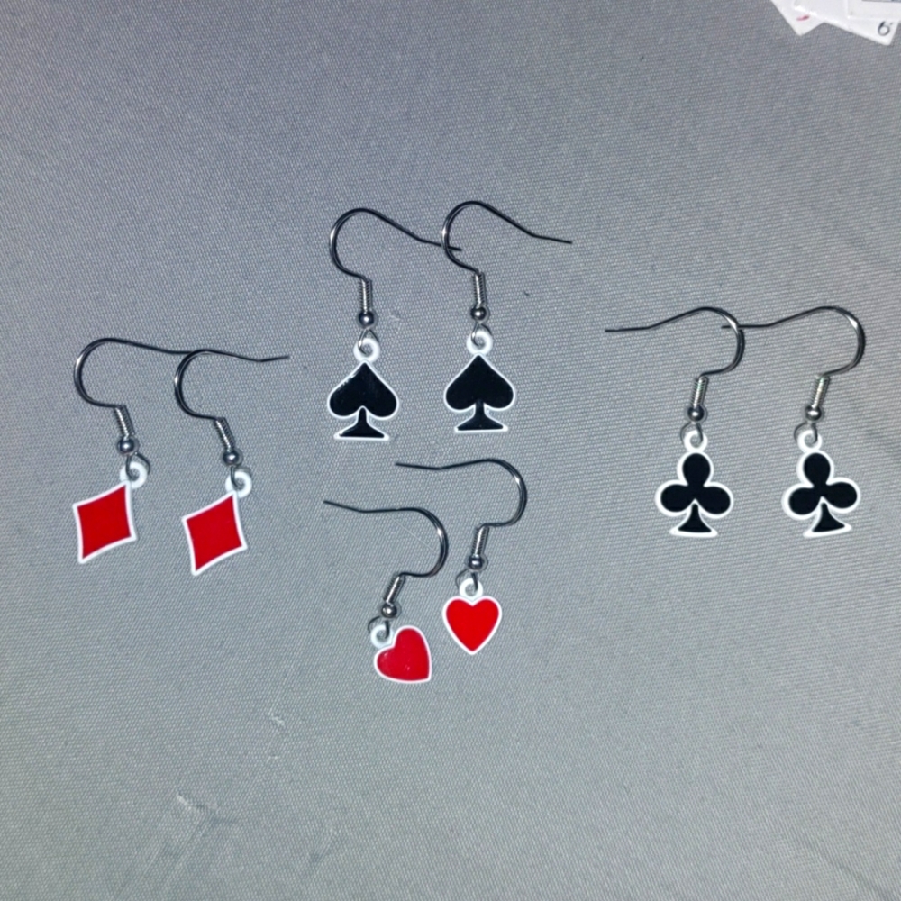 Card inspired set of earrings, never worn and highly sanitized.